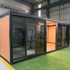 Side view of 10FT flat roof glass expandable container house with modern curtain wall design
