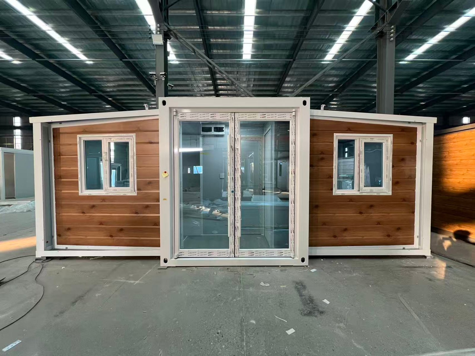 Front view of Australian standard wood grain expandable container house with modern residential exterior