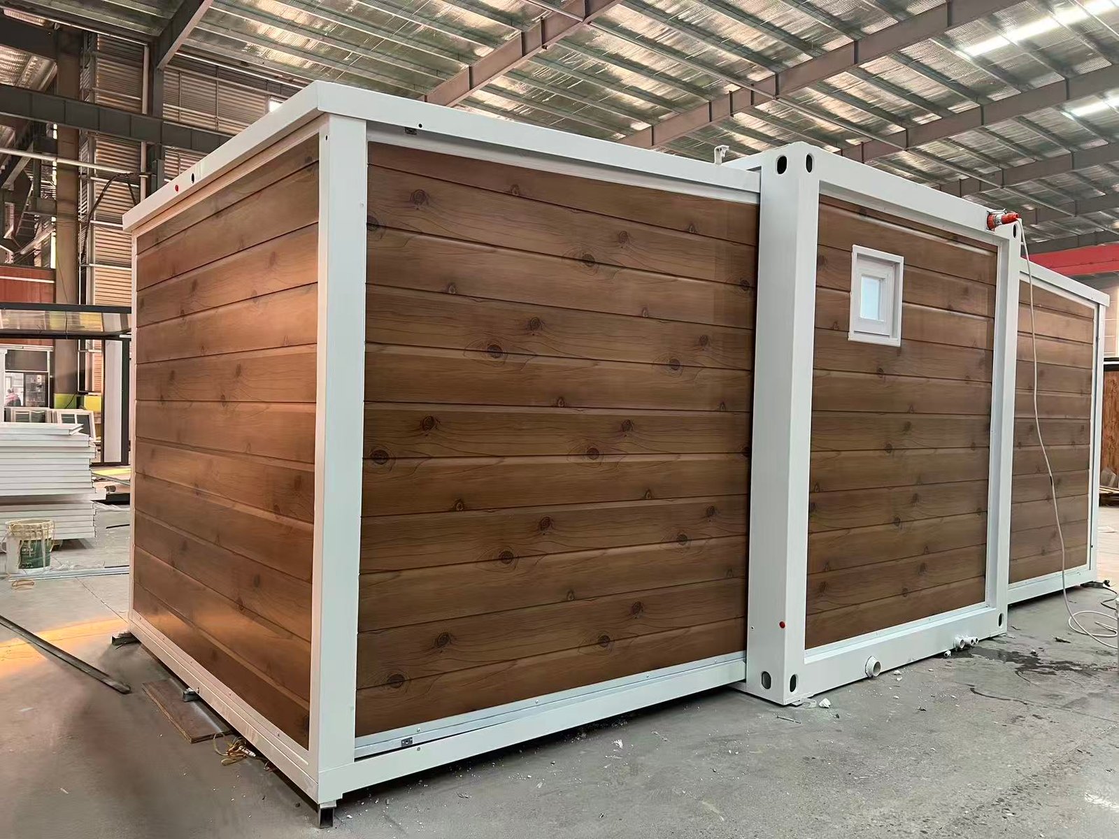 Rear view of Australian standard wood grain expandable container house with wood grain exterior finish
