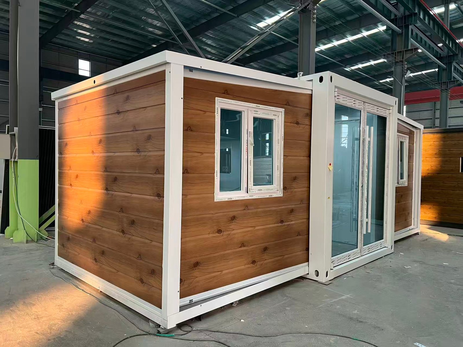 Side view of Australian standard wood grain expandable container house with galvanized steel frame and insulated walls