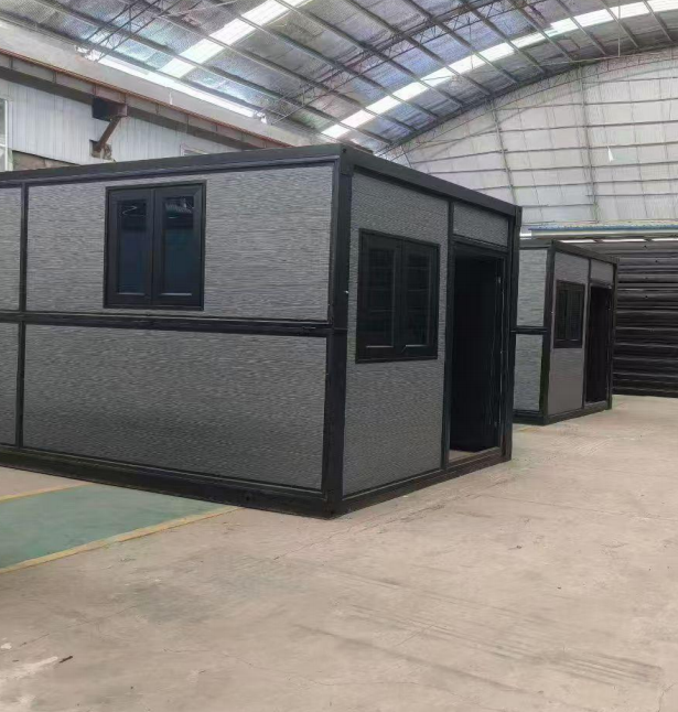 Flat pack container house with black steel frame and insulated wall panels