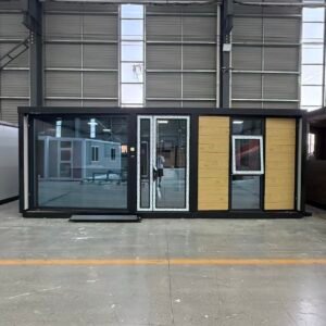 Front view of a flat roof expandable container house with a half-width floor-to-ceiling window facade