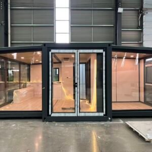 Front view of a prefab sunroom with two glass walls and integrated LED strip lighting