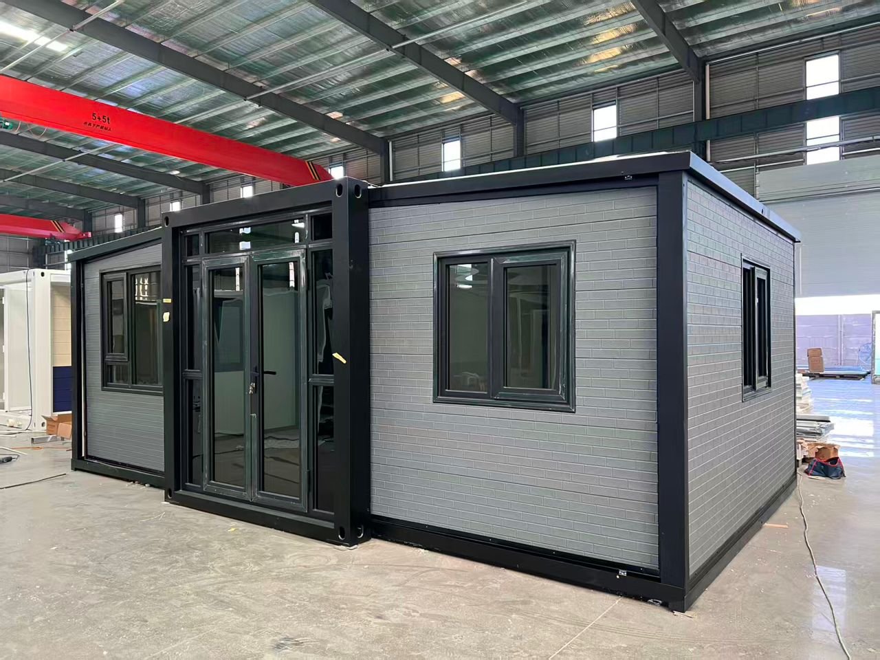 Front view of premium grey insulated expandable container house with modern modular design