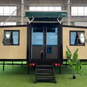 Front view of trailer-mounted expandable container house with mobile modular design