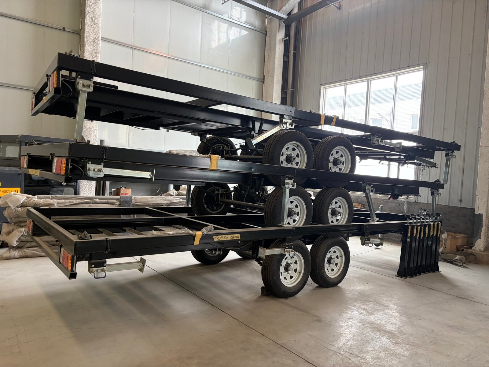 Trailer chassis and wheel system of mobile expandable container house