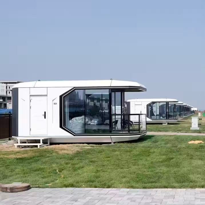 23sqm Space Capsule glamping pod on garden lawn, compact modular prefab cabin with outdoor balcony terrace