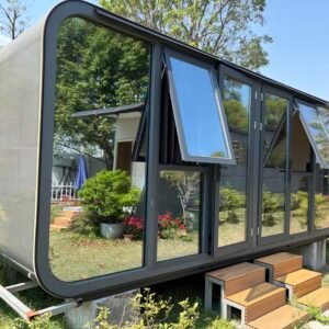 Apple Cabin glamping pod on campsite garden, modern movable prefab tiny house with large glass windows